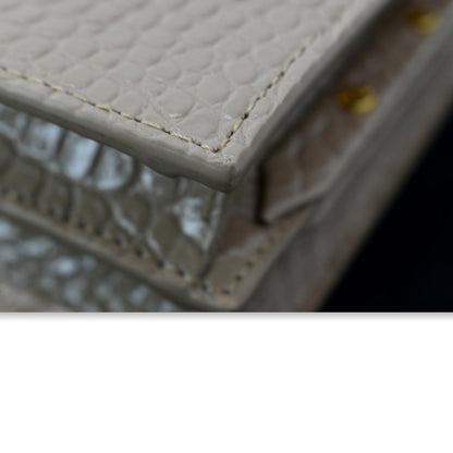 YVES SAINT LAURENT Cassandra Top Handle Embossed Shoulder Bag Beige