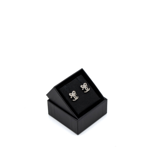 Chanel CC Logo Bow Earrings Crystal Silver Tone