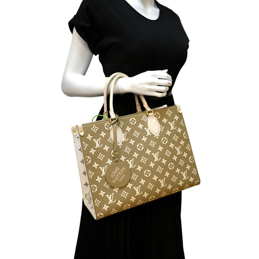 LOUIS VUITTON Women Onthego Spring City MM Monogram Empreinte Leather Shoulder Bag Bicolor