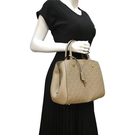 LOUIS VUITTON Montaigne MM Monogram Empreinte Shoulder Bag Tourterelle