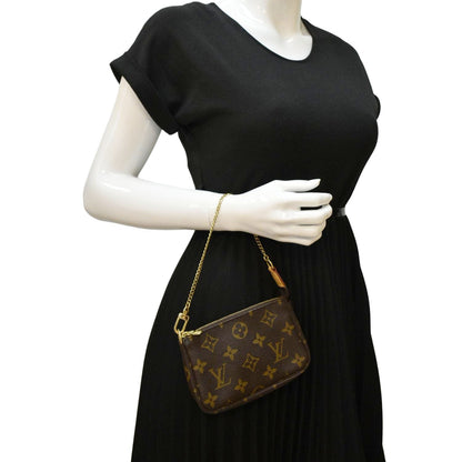 LOUIS VUITTON Pochette Mini Monogram Canvas Accessoires Pouch Brown