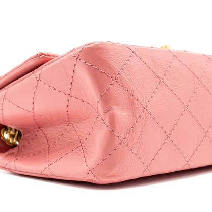Chanel Mini 2.55 Reissue flap bag calfskin pink