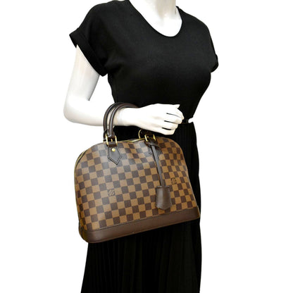 LOUIS VUITTON Alma PM Damier Ebene Satchel Bag Brown