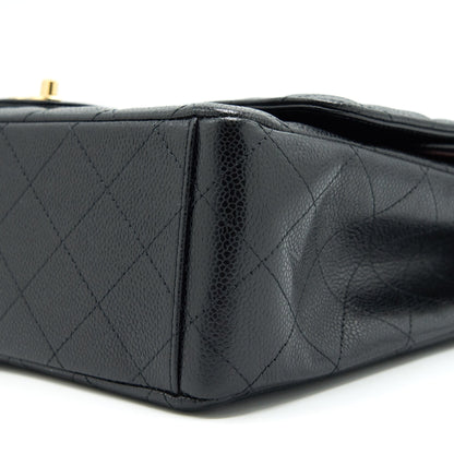 Chanel Maxi Classic Double Flap Caviar black  serial 20