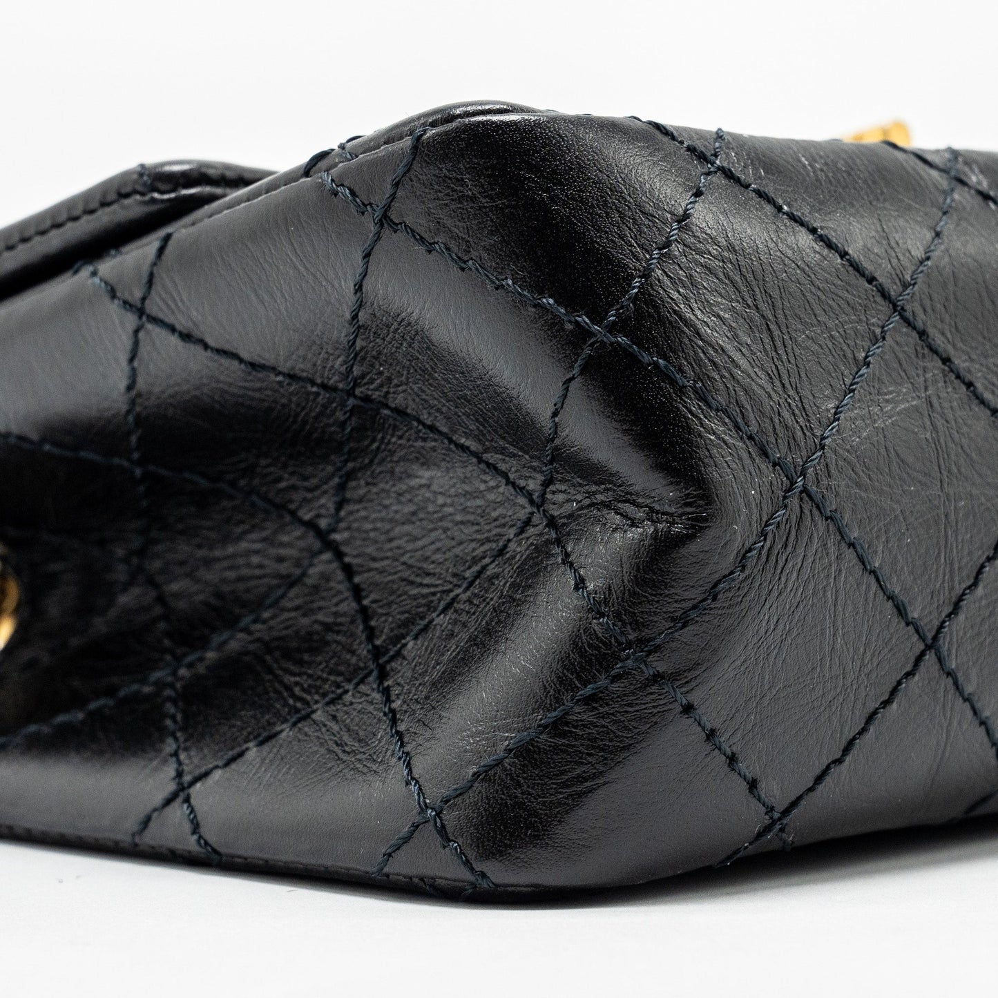 Chanel Mini 2.55 reissue flap bag aged calfskin black