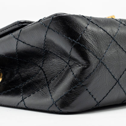 Chanel Mini 2.55 reissue flap bag aged calfskin black