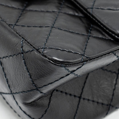 Chanel Mini 2.55 reissue flap bag aged calfskin black