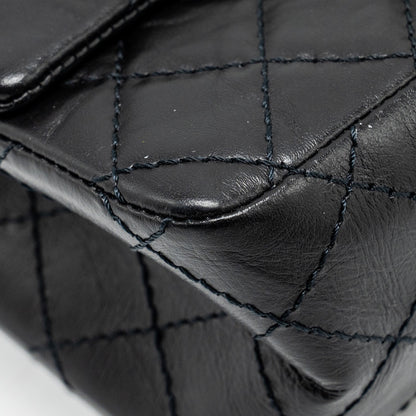 Chanel Mini 2.55 reissue flap bag aged calfskin black