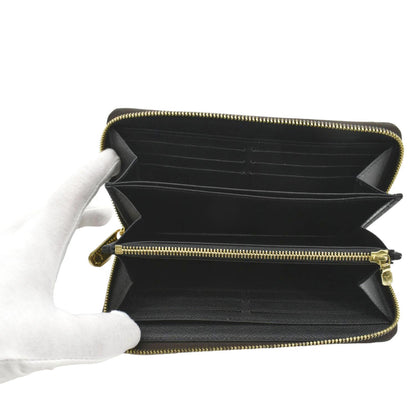 LOUIS VUITTON Giant Monogram Reverse Zippy Wallet Brown