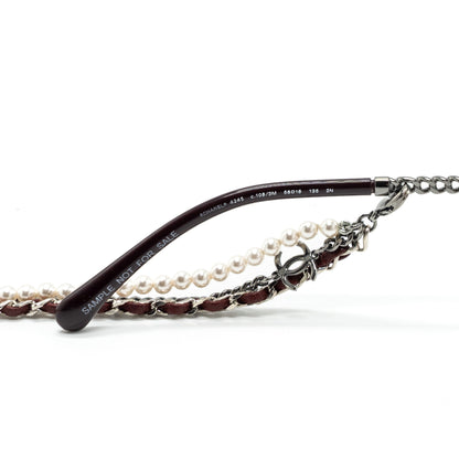 Chanel round sunglasses with chain red