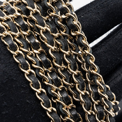 Chanel quilted super mini tote with chain lambskin black L