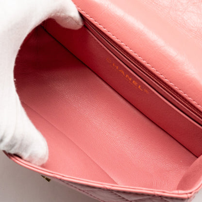 Chanel Mini 2.55 Reissue flap bag calfskin pink