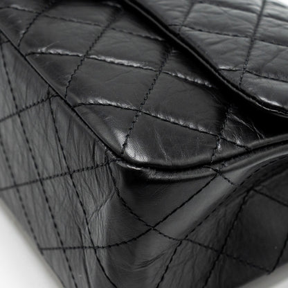 Chanel Maxi 2.55 reissue flap bag aged calfskin Black