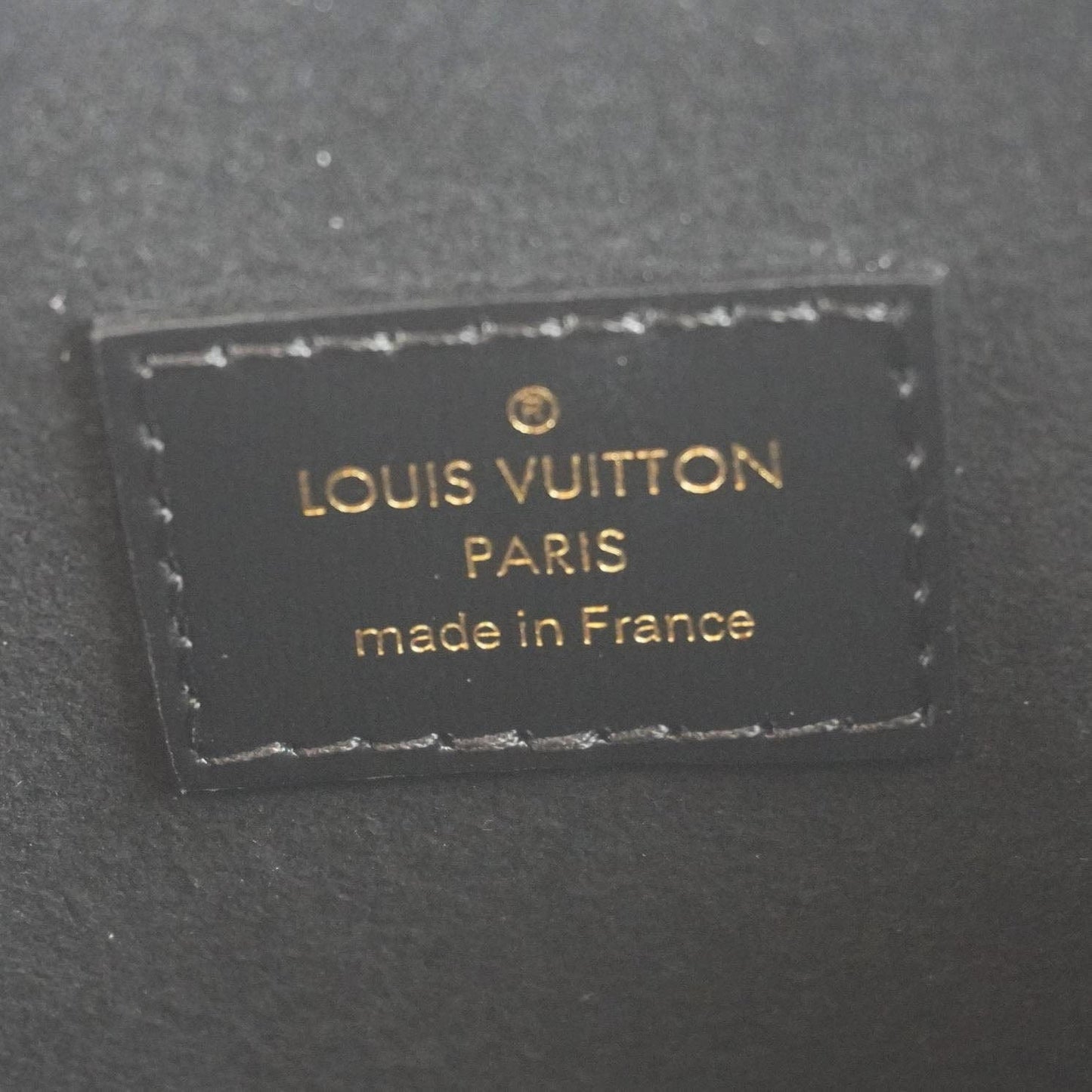 LOUIS VUITTON Noe Monogram Reverse Canvas Purse Brown