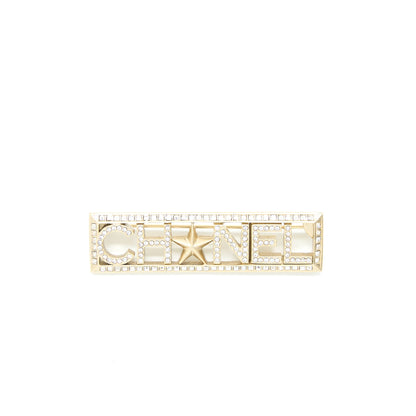 Chanel Letter/Star Brooch Crystal Light Gold Tone