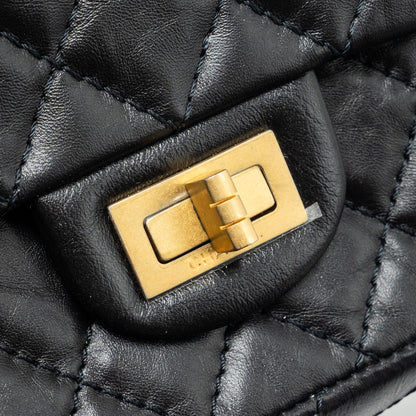 Chanel Mini 2.55 reissue flap bag aged calfskin black