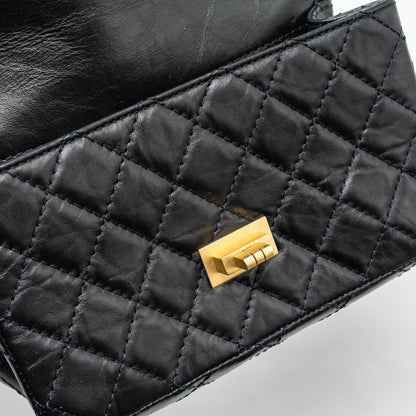 Chanel Mini 2.55 reissue flap bag aged calfskin black