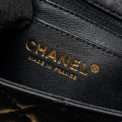 Chanel Mini 2.55 reissue flap bag aged calfskin black