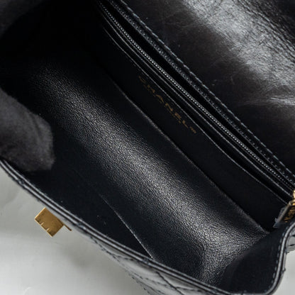 Chanel Mini 2.55 reissue flap bag aged calfskin black