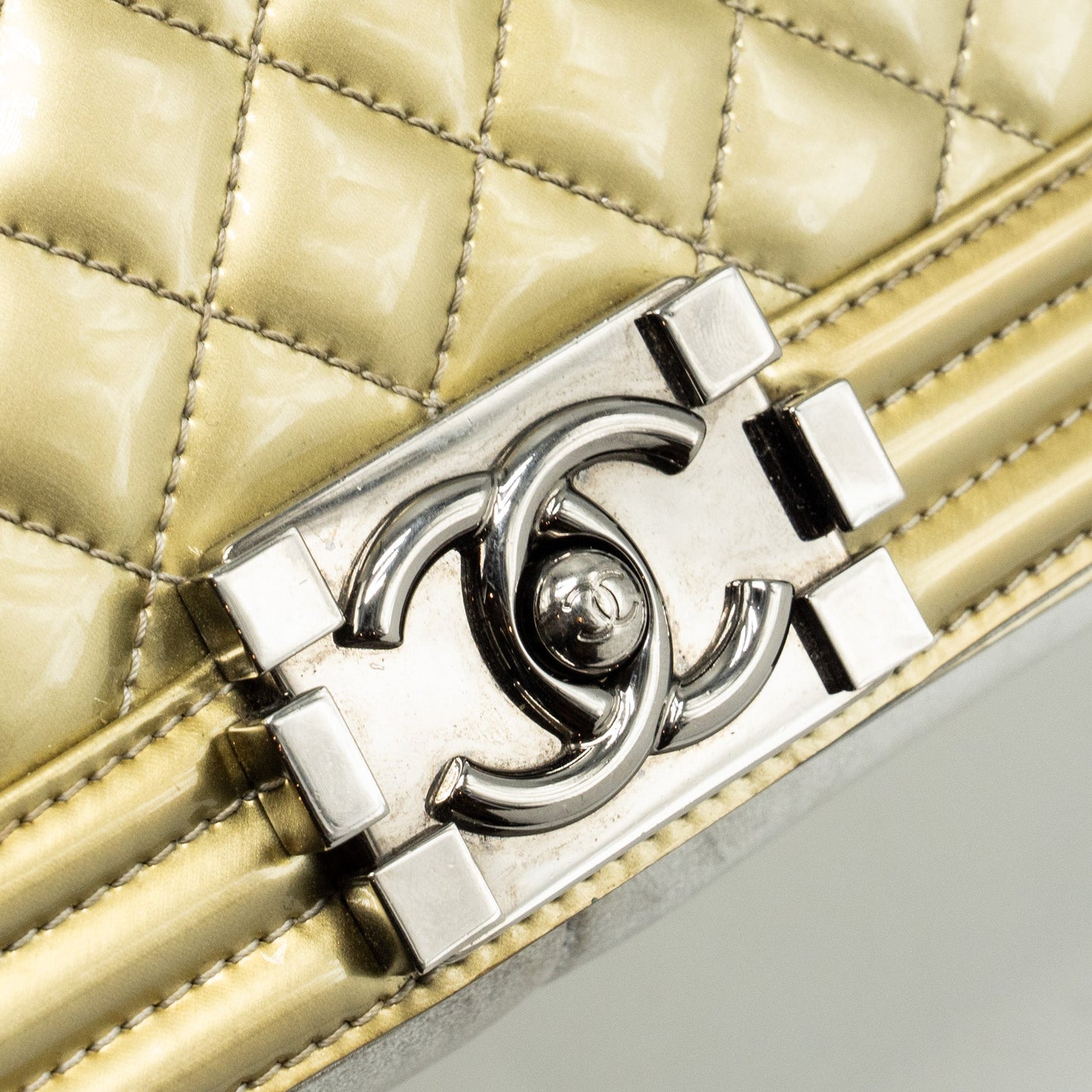 Chanel medium boy bag patent light gold / silver