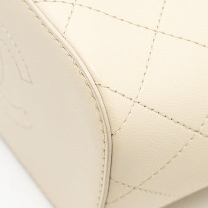 Chanel bucket bag lambskin creamy white