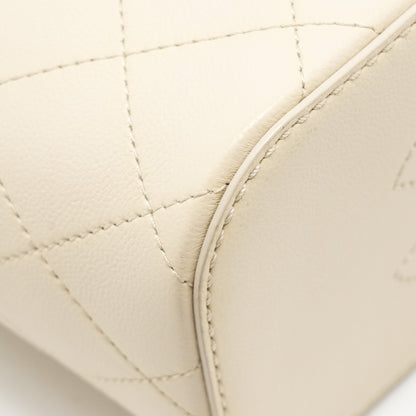 Chanel bucket bag lambskin creamy white