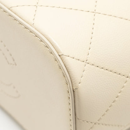 Chanel bucket bag lambskin creamy white