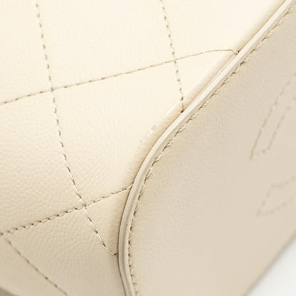 Chanel bucket bag lambskin creamy white