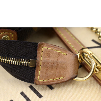 LOUIS VUITTON Pochette Eva Monogram Canvas Crossbody Bag Brown