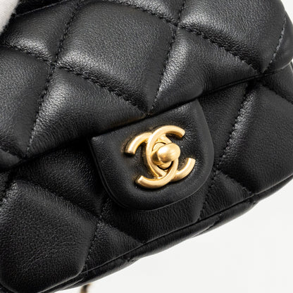 Chanel 21A top handle mini flap card holder with chain lambskin black