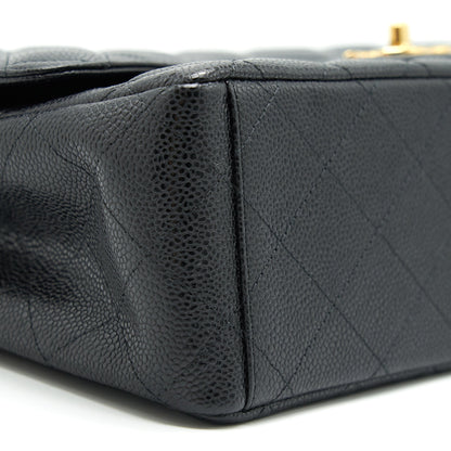 Chanel Maxi Classic double Flap Black Caviar