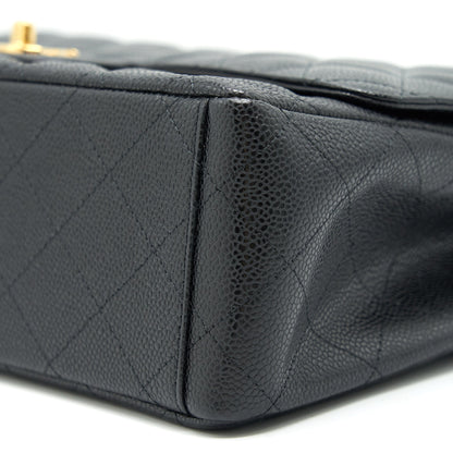 Chanel Maxi Classic double Flap Black Caviar