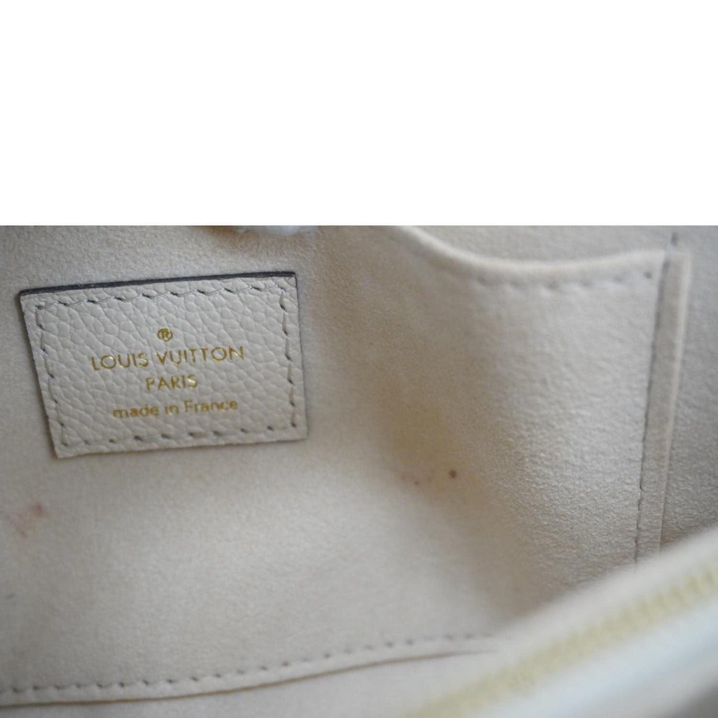 LOUIS VUITTON Madeleine MM Monogram Empreinte Leather Top Handle Bag White