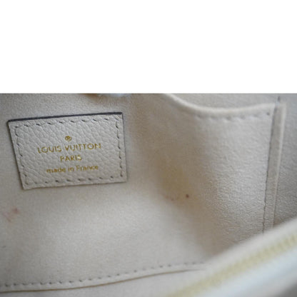 LOUIS VUITTON Madeleine MM Monogram Empreinte Leather Top Handle Bag White