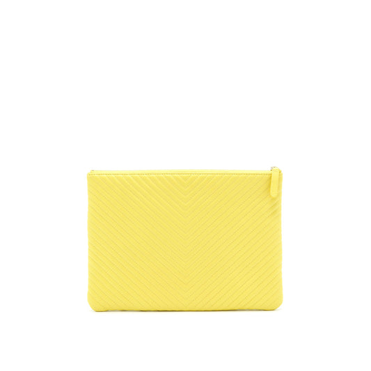 CHANEL CHEVRON CLUTCH BAG IN YELLOW