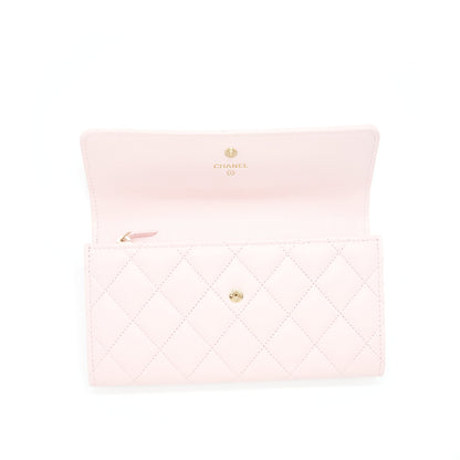 Chanel 22S detailed logo flap long wallet caviar light pink with L