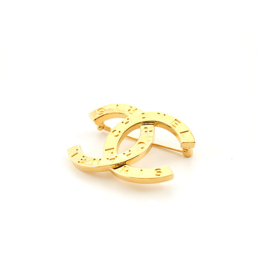 Chanel CC logo with letter brooch L