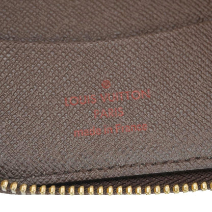 LOUIS VUITTON Zip Around Damier Ebene Wallet Brown