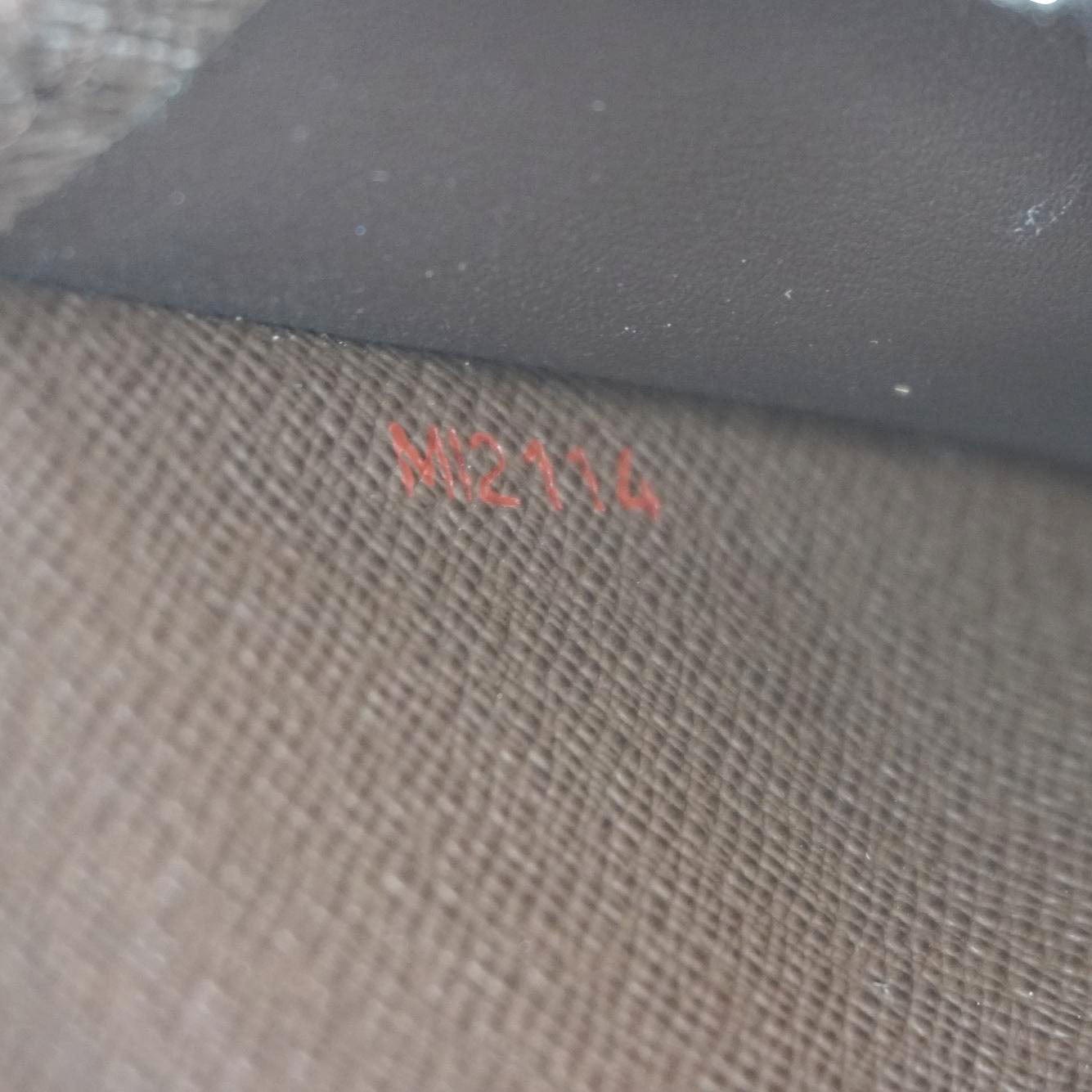 LOUIS VUITTON Zip Around Damier Ebene Wallet Brown