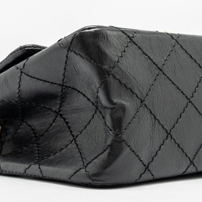Chanel mini 2.55 reissue flap bag aged calfskin black