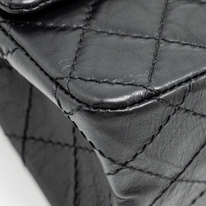 Chanel mini 2.55 reissue flap bag aged calfskin black