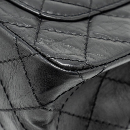 Chanel mini 2.55 reissue flap bag aged calfskin black