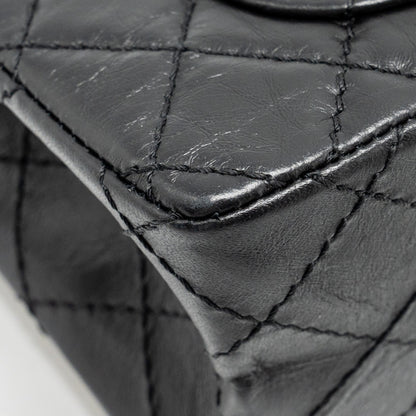 Chanel mini 2.55 reissue flap bag aged calfskin black