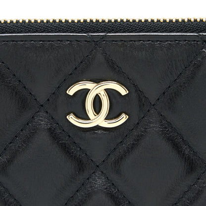 Chanel O-Case Pouch Pearl/Aged Calfskin Black L