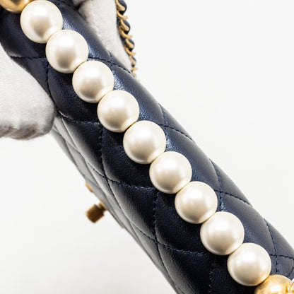 Chanel pearl decorated quilted flap bag lambskin navy
