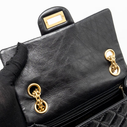 Chanel mini 2.55 reissue flap bag aged calfskin black