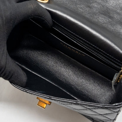 Chanel mini 2.55 reissue flap bag aged calfskin black
