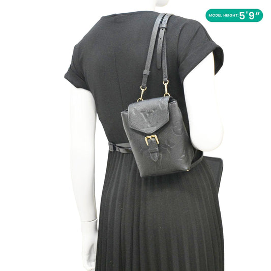 LOUIS VUITTON Tiny Monogram Empreinte Leather Backpack Black