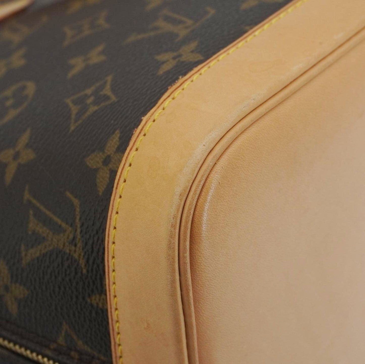 LOUIS VUITTON Alma Monogram Canvas Satchel Bag Brown