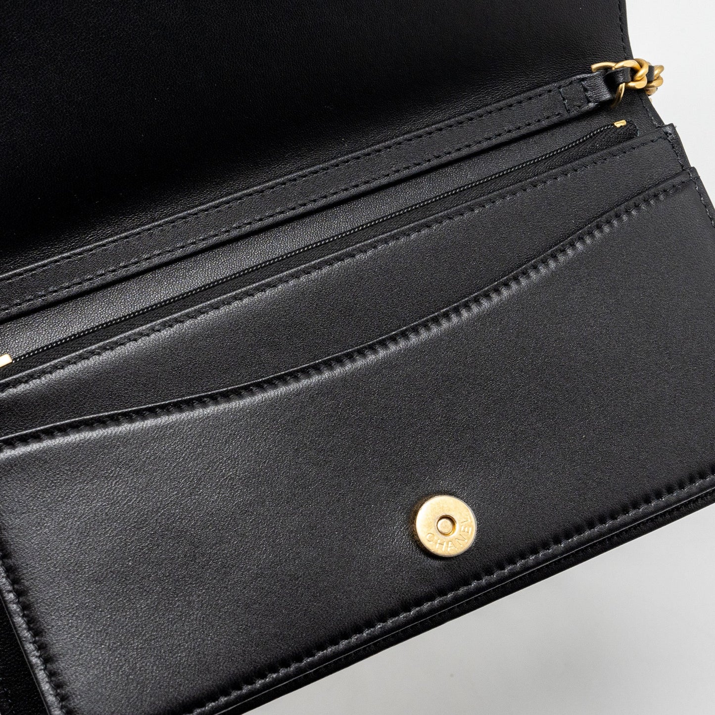 Chanel 23A clutch with chain lambskin black  (microchip)